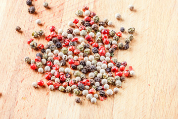 pepper mix on a wooden background