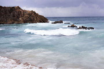 Mediterranean beach in Costa Brava, stormy day.Blanes,Catalonia,Spain.