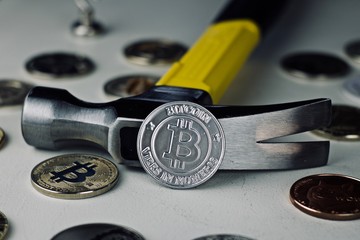 Bitcoin Coin and hammer