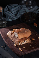 Hearty Homemade Chicken Pot Pie on black wooden