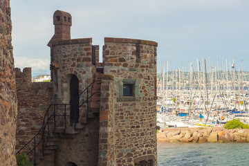 Fototapeta na wymiar Panoramic view on the tower of Château de la Napoule castle located on the waterfront in Mandelieu-la-Napoule, France, Europe