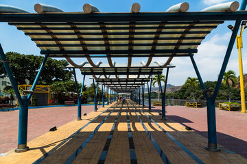Pedestrian walkway and park on the banks of Estero Salado in the city of Guayaquil
