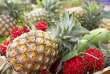 Pineapples and other tropical fruit at asian market