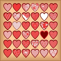 Red hearts on a beige background