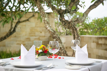 Romantic table setup for two, outdoors