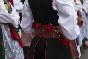 Fototapeta na wymiar Polish folk dance group with traditional costume