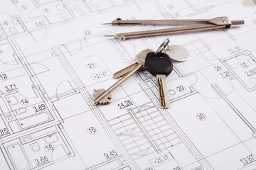 Architectural project, engineering tools on table.