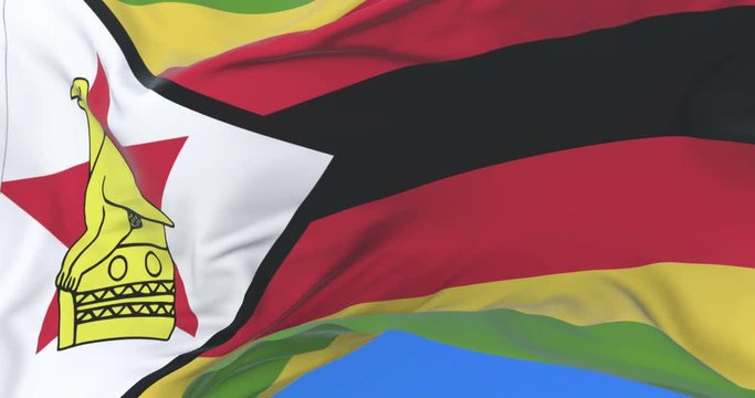 Flag of Zimbabwe waving at wind in slow with blue sky, loop