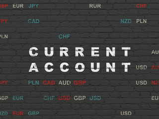Currency concept: Painted white text Current Account on Black Brick wall background with Currency