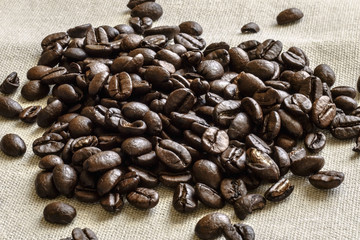 Coffee beans on linen background