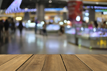Blank wooden table of brown in fornt blurred bokeh background, copy space, for presentation product