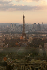 early autumn in Paris. The Eiffel Tower in the fog, twilight