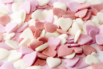 St. Valentine's Day. multi-colored sugar hearts symbol of sweet love and happiness. background