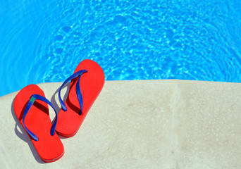 Pair of red flip-flops.