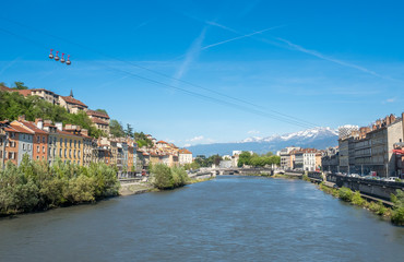 Fototapeta na wymiar Grenoble-Bastille cable car, four bubbles on sling, transport to hill and fortress of Bastille cross Isere river in Grenoble, France