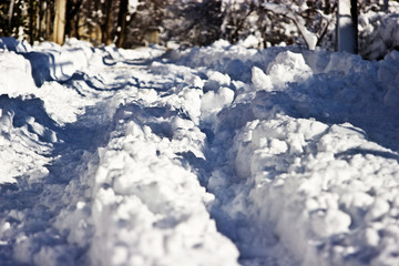Winter road in the sunlight