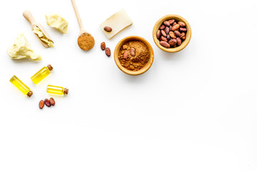 Cocoa butter for skin care. White background top view copy space