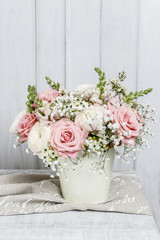 Obraz na płótnie Canvas Bouquet of roses, matthiolas and ranunculus flowers