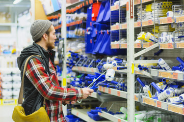Fototapeta premium Man in a hardware store