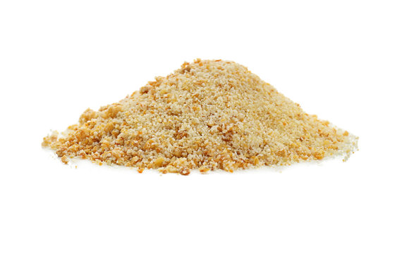 Granulated dried garlic on white background