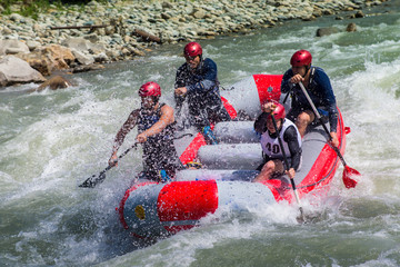 GROUP OF MEN AND WOMEN