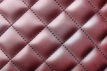 Artificial leather texture as background, closeup. Upholstery fabric