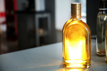 Bottle of cooking oil on table