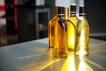 Bottles of cooking oil on table