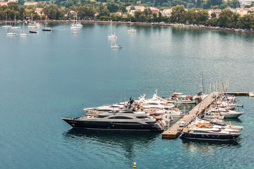 Parked yachts and boats near Corfu island, Greece.