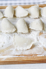 Fototapeta na wymiar Raw dumplings before boiling in hot water.