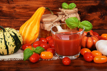 healthy tomato juice with basil made of sweet cocktail tomatoes