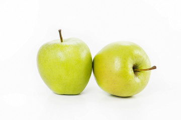 Two green apples isolated on white background.