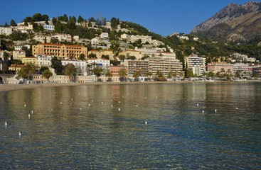 Fototapeta na wymiar Landscape view of the French Riviera city of Menton in the Alpes Maritimes seen from the Mediterranean Sea
