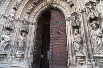 Cathedral Church of Saint Mary,door entrance and religious image statue in Murcia,Spain.