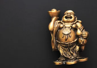 Poster Bouddha Golden Buddha on a black background   