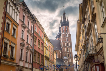 Fototapeta na wymiar Krakow, street in the historic Polish city with Saint Mary's Basilica.