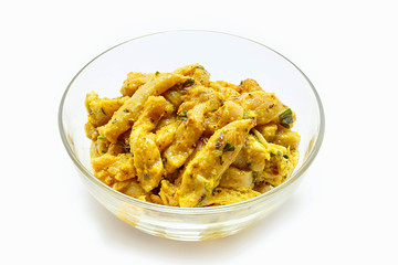 Indian chicken curry on bowl ready to cook. Marinated Chicken in chili, turmeric and different spices, isolated on white background.