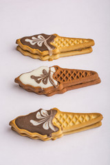 Biscuits with colorful glaze. Sweets in the form of ice cream. Holiday for children. Delicious homemade biscuits. On a white background