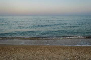 Beautiful evening seascape and purple sky.