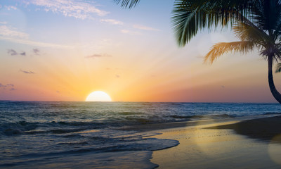 Naklejka na ściany i meble Art Beautiful sunset over the tropical beach