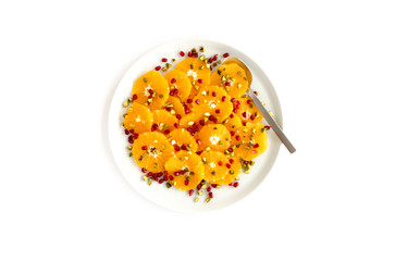 Orange, Pomegranate and Pistachio Salad on White Background