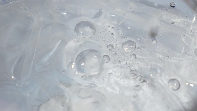 Water with ice in a glass