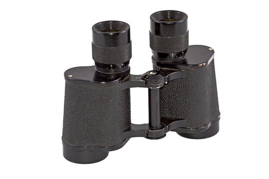 Old binoculars on a white background