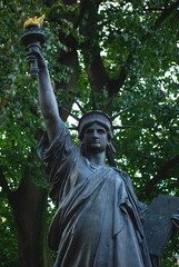 Fototapeta premium A minature version of the Statue of Liberty in the gardens of the Palace du Luxembourg in Paris, France