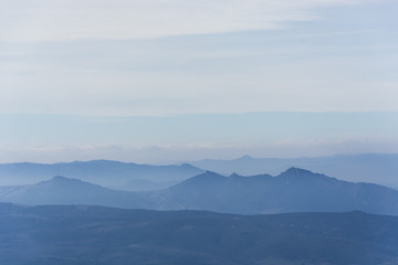 Fototapeta na wymiar Mountain peaks on the horizon