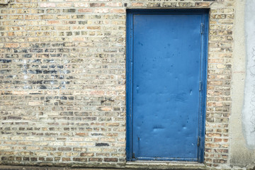 Blue door and brick wall