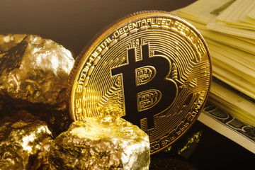 Nugget gold and dollar bills business concept