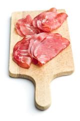 Sliced prosciutto crudo.