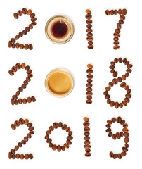 dates made of coffee beans with a glass of espresso. Years 2017, 2018 and 2019