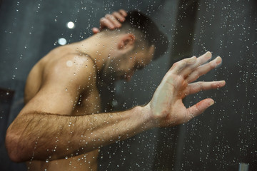 Fototapeta na wymiar Bachelor man daily routine taking shower single lifestyle concept looking down
